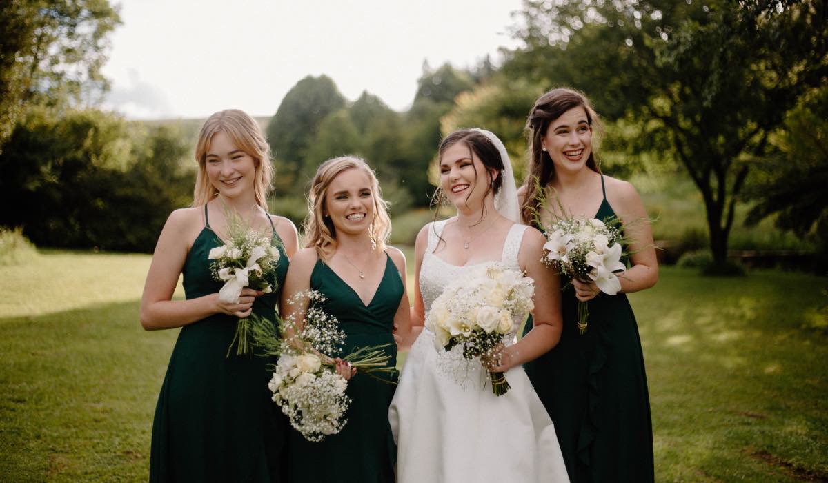 bridesmaids posing for a photo at a wedding
