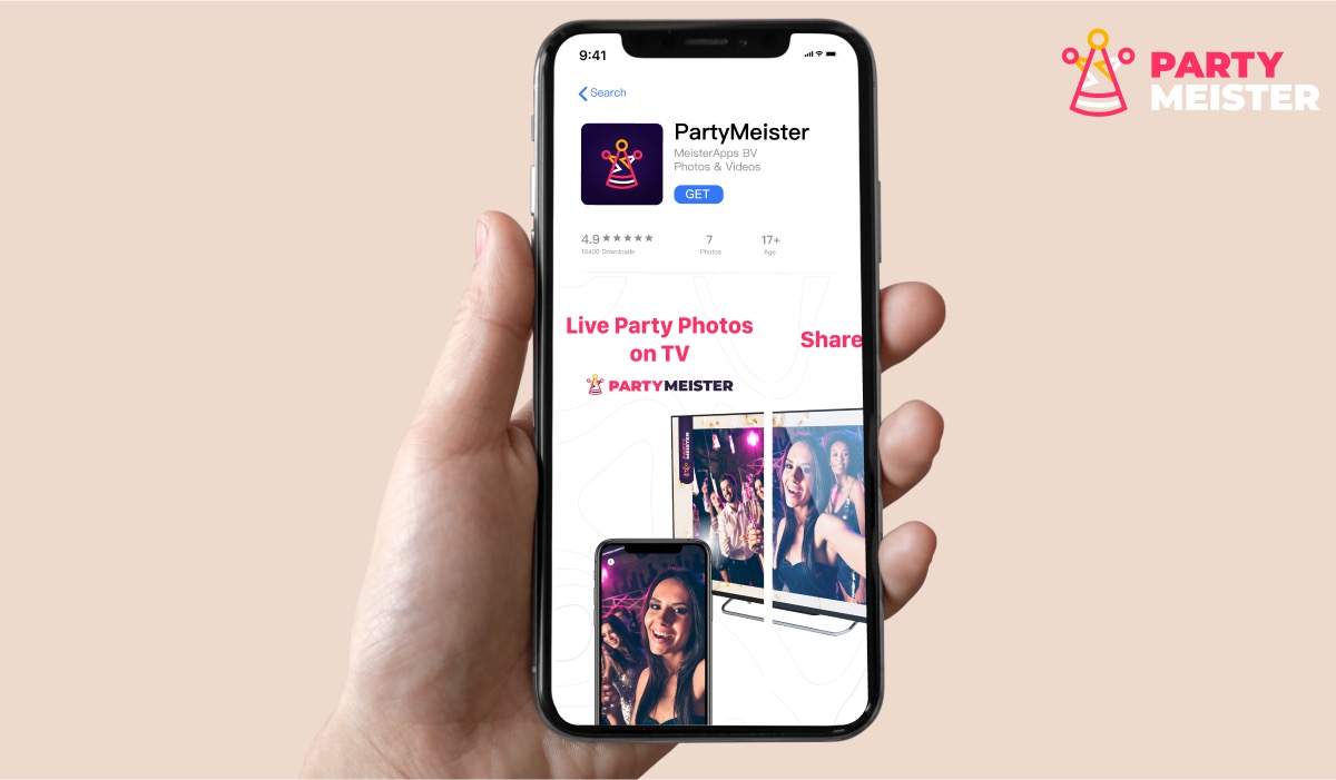 A hand holding an iPhone with the PartyMeister App Store page